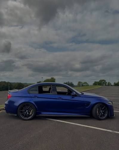Blue BMW F80 M3, side view